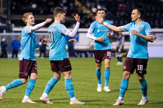 Euan Henderson celebrates scoring for Hearts against Raith Rovers.