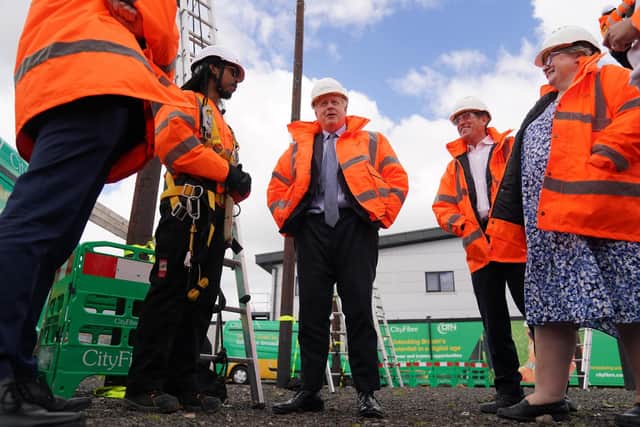 Prime Minister Boris Johnson and works and pensions secretary Therese Coffey during a visit to CityFibre Training Academy in Stockton-on-Tees, Darlington. Picture: Owen Humphreys/PA Wire