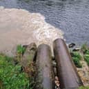 Heavily silted liquid poured into the Dee, turning the normally clear water a dirty brown colour.