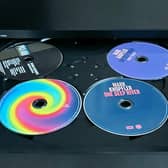 The Yamaha multi-disc player has a feature that allows you to eject the tray and change four of the discs while the fifth keeps playing. Picture: Scott Reid
