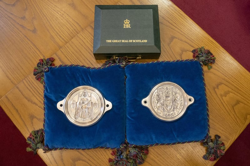 The Great Seal of Scotland on the front bench of the court as Humza Yousaf is sworn in as First Minister of Scotland at the Court of Session