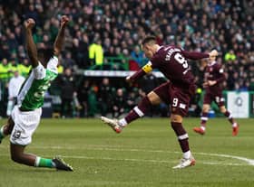 Hearts' Lawrence Shankland scores to make it 2-0 with an excellent strike.