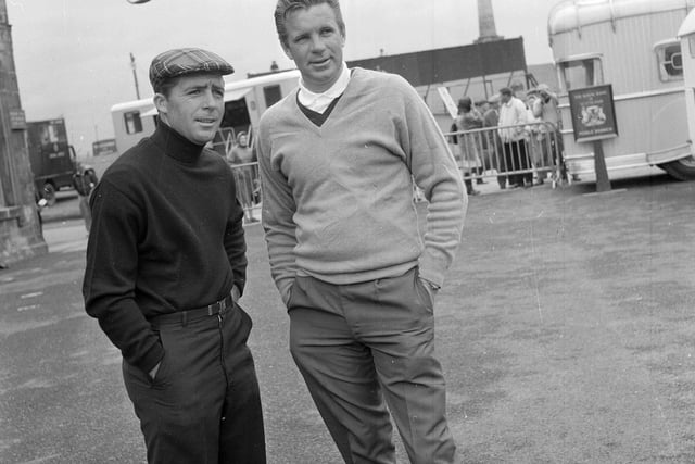 Harold Henning talks with Gary Player at the 1964 St Andrews Open Championships.