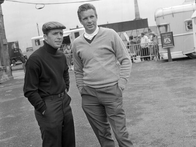 Harold Henning talks with Gary Player at the 1964 St Andrews Open Championships.