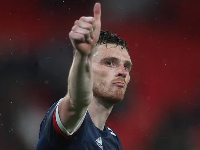Andy Robertson salutes the fans at full time