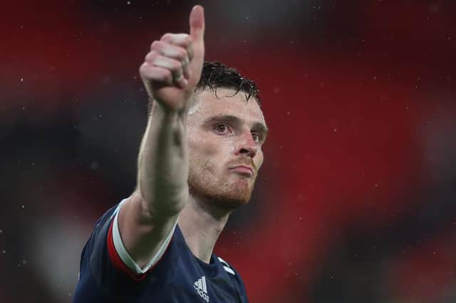 Andy Robertson salutes the fans at full time