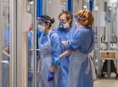 Staff check on patients suffering with Covid-19 on the critical care unit at the Royal Papworth Hospital, Cambridge picture: PA