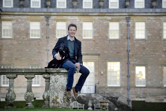 The late Hugo Burge at Marchmont House, with his dog Finn. Photo: Colin Hattersley.