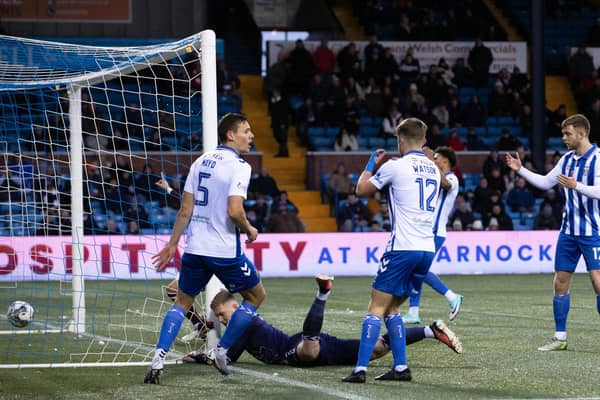 Hearts won 1-0 at Kilmarnock after this bizarre own goal by Will Dennis.