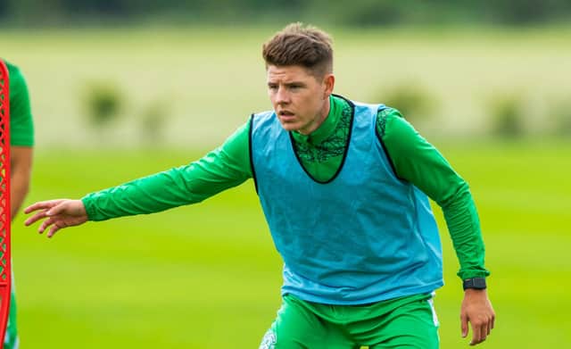 Kevin Nisbet takes part in his first full training session as a Hibs player