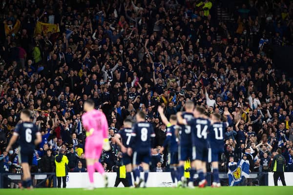 Jubilant Scotland fans celebrate as Steve Clarke's men defeat Israel at Hampden Park in October. Picture: SNS