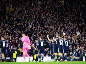 Jubilant Scotland fans celebrate as Steve Clarke's men defeat Israel at Hampden Park in October. Picture: SNS