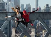 MJ (Zendaya) and Spider-Man (Tom Holland) jump off the bridge in Spider-Man: No Way Home. Photo: PA Photo/©2021 CTMG.