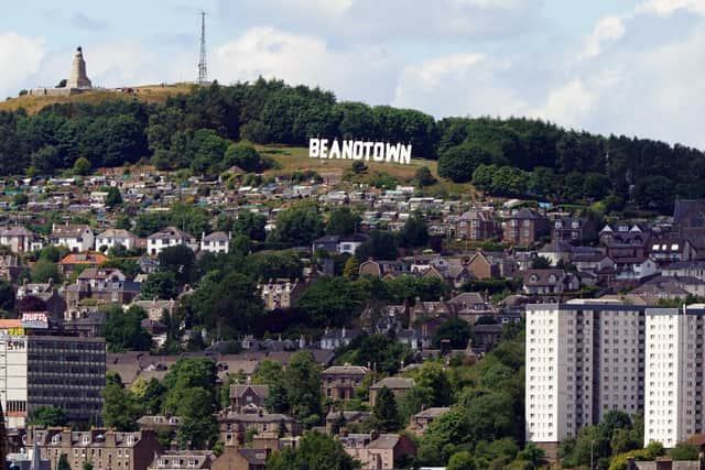 The giant sign erected at Dundee Law renaming the city of Dundee to Beanotown to mark the start of the Dundee Bash Street Festival, which celebrates the city's comic book heritage. Designers have taken their inspiration from the famous Hollywood sign, the sign is six-metres high by 38-metres long and will be seen from around the city and across the Tay for the duration of the festival. Picture date: Friday July 15, 2022.
