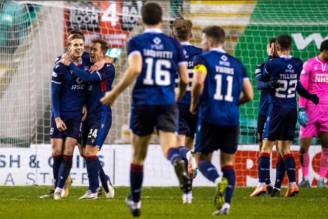 Oli Shaw celebrates after scoring to make it 2-0 for Ross County.