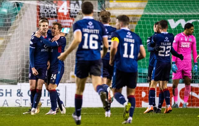 Oli Shaw celebrates after scoring to make it 2-0 for Ross County.