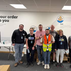 The Amazon Dunfermline team packed 1,500 backpacks for The Big House Multibank
