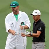 Collin Morikawa with his caddie prior to The Masters at Augusta National Golf Club. Picture: Gregory Shamus/Getty Images.