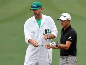 Collin Morikawa with his caddie prior to The Masters at Augusta National Golf Club. Picture: Gregory Shamus/Getty Images.