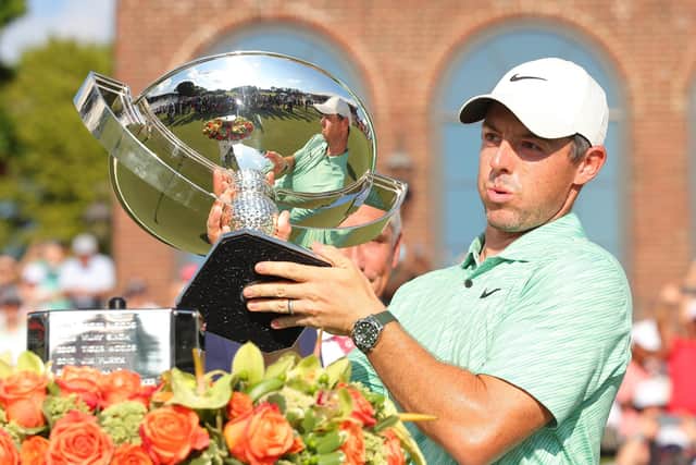 Northern Ireland's Rory McIlroy celebrates with the FedEx Cup after winning during the final round of the TOUR Championship at East Lake Golf Club