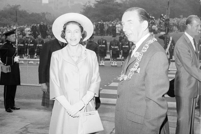 The Queen arrives in Glasgow for a visit in September 1964.