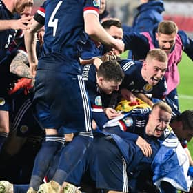 Scotland's players celebrate after winning the Euro 2020 play-off qualification football match between Serbia and Scotland at the Red Star Stadium in Belgrade on November 12, 2020. Photo by ANDREJ ISAKOVIC/AFP via Getty Images