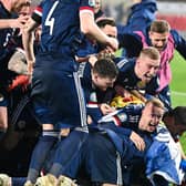 Scotland's players celebrate after winning the Euro 2020 play-off qualification football match between Serbia and Scotland at the Red Star Stadium in Belgrade on November 12, 2020. Photo by ANDREJ ISAKOVIC/AFP via Getty Images