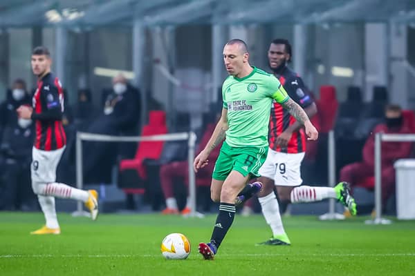 Scott Brown in possession for Celtic during their defeat to Milan in the San Siro. Picture: PA