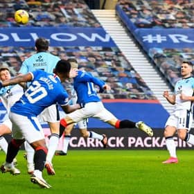 Ryan Kent heads Rangers into an early lead against Ross County at Ibrox. (Photo by Rob Casey / SNS Group)