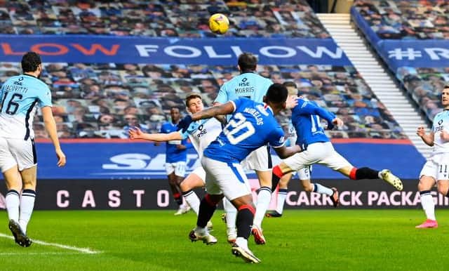 Ryan Kent heads Rangers into an early lead against Ross County at Ibrox. (Photo by Rob Casey / SNS Group)