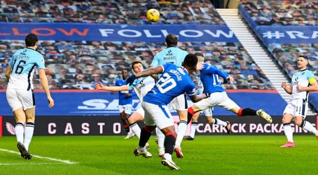 Ryan Kent heads Rangers into an early lead against Ross County at Ibrox. (Photo by Rob Casey / SNS Group)