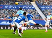 Ryan Kent heads Rangers into an early lead against Ross County at Ibrox. (Photo by Rob Casey / SNS Group)