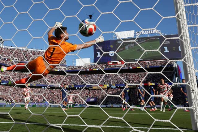 Malik Tillman scores the United States' second goal against Bosnia and Herzegovina to send the home nation into the Round of 16 at the World Cup (Picture: Charlotte Wilson/Getty Images)