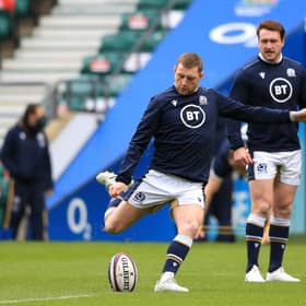 Finn Russell practises his kicking at Twickenham under the watchful eye of Scotland captain Stuart Hogg. Picture: Adam Davy/Getty Images