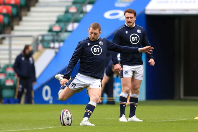 Finn Russell practises his kicking at Twickenham under the watchful eye of Scotland captain Stuart Hogg. Picture: Adam Davy/Getty Images