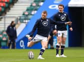 Finn Russell practises his kicking at Twickenham under the watchful eye of Scotland captain Stuart Hogg. Picture: Adam Davy/Getty Images