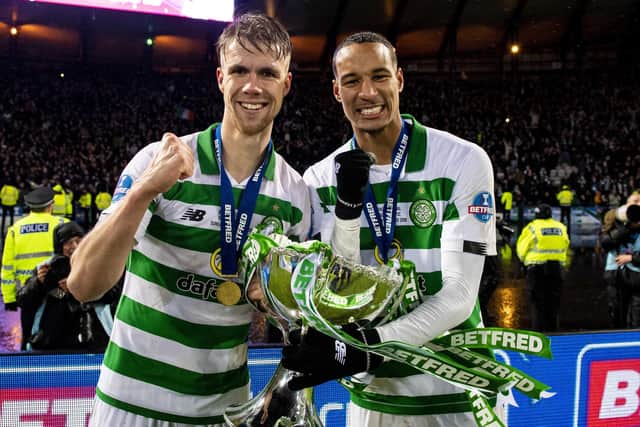 Celtic's Kristoffer Ajer (left) and Christopher Jullien with the Betfred Cup trophy following the 1-0 win over Rangers in the 2019 final. (Photo by Craig Williamson / SNS Group)