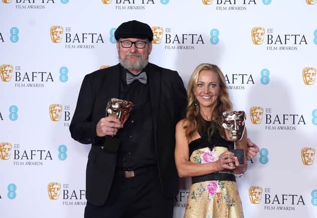 All Quiet on the Western Front co-writers Ian Stokell and Lesley Paterson with their Baftas during the 2023 EE British Academy Film Awards, held at the Royal Festival Hall, London, February, 2023. Pic: Dominic Lipinski/Getty Images)