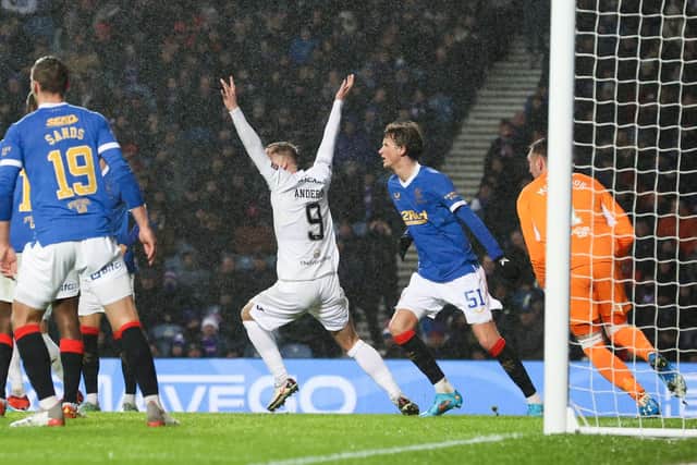 Livingston wanted a penalty at Ibrox for a potential handball incident.