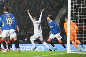 Livingston wanted a penalty at Ibrox for a potential handball incident.