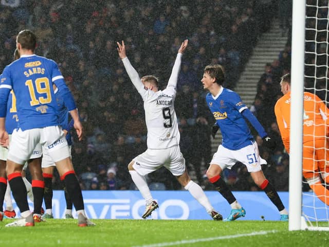Livingston wanted a penalty at Ibrox for a potential handball incident.