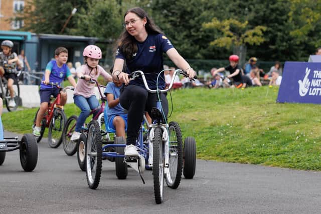 GLASGOW, SCOTLAND - AUGUST 10: Two-time Olympic gold medalist, Katie Archibald, visited Free Wheel North, a leading cycling inclusion charity in Scotland to celebrate the UCI Cycling World Championships and to see the impact of National Lottery investment into cycling on August 10, 2023 in Glasgow, Scotland. (Photo by Steve Welsh/Getty Images for The National Lottery)