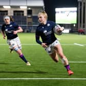 Megan Gaffney scores against Japan in 2021. The winger has announced her retirement from international rugby.  (Photo by Ross Parker / SNS Group)