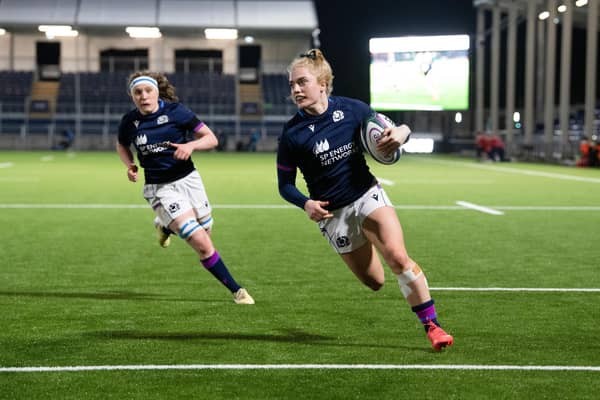 Megan Gaffney scores against Japan in 2021. The winger has announced her retirement from international rugby.  (Photo by Ross Parker / SNS Group)