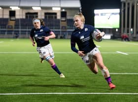 Megan Gaffney scores against Japan in 2021. The winger has announced her retirement from international rugby.  (Photo by Ross Parker / SNS Group)