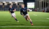 Megan Gaffney scores against Japan in 2021. The winger has announced her retirement from international rugby.  (Photo by Ross Parker / SNS Group)