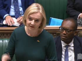 Prime Minister Liz Truss, expected to reveal details of the support package this week, speaks in the House of Commons alongside Chancellor Kwasi Kwarteng