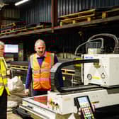 From left: Business Minister Ivan McKee and Solway Recycling boss Roy Hiddleston at the firm's Dumfries facility. Picture: Graham Edwards.