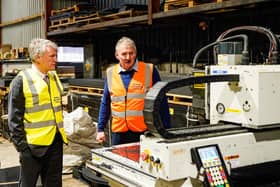 From left: Business Minister Ivan McKee and Solway Recycling boss Roy Hiddleston at the firm's Dumfries facility. Picture: Graham Edwards.