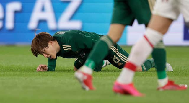 Celtic's Kyogo Furuhashi is left in agony after another robust challenge in the Alkmaar encounter. His manager says referees must deal with the "treatment" being meted out to him "on face value" to ensure the in-form Japanese striker is allowed to deliver on his talents.  (Photo by Rico Brouwer / SNS Group)